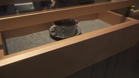 Closing of a modern pull-out kitchen drawer Stock Footage 273057795