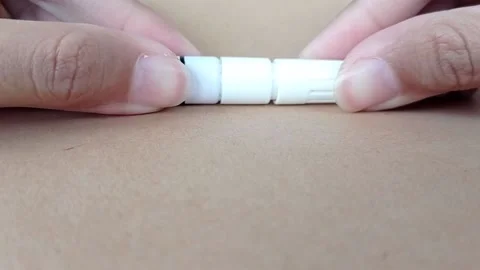 Closing a new white pen Stock Footage 146247585