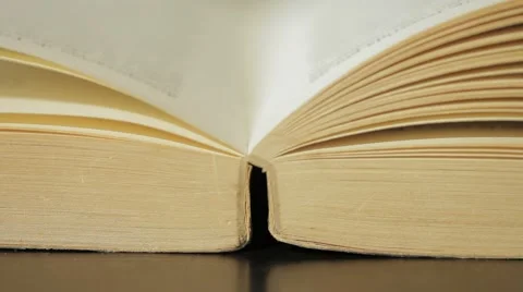 Closing old book in the library Stock Footage 54596609