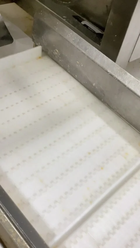 Closing packaging process in a food production line Stock Footage 333306796