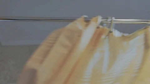 Closing the shower curtain Stock Footage 100051081