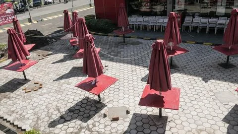 Closing umbrella table Stock Photos