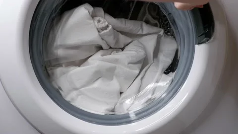 Closing the washing machine. Laundry. Stock Footage 167424177