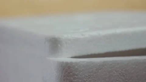 Closing white polystyrene  box Stock Footage 256092298