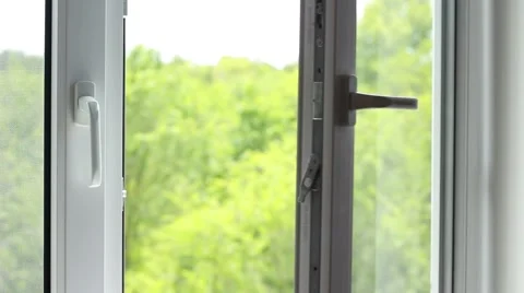 Closing window into a garden 動画素材 64622438