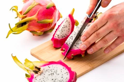 Closup on a second cut through a halved pitaya Stock Photos