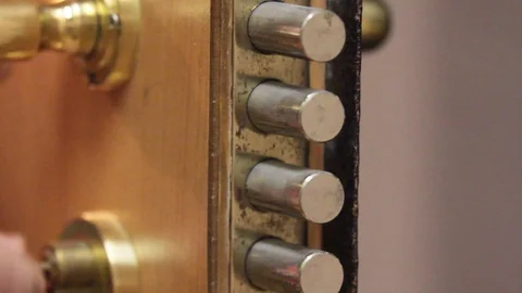 Closure of the lock cylinder Stock Footage 97715370