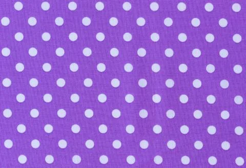 Cloth background texture of white dotted purple textile Stock Photos