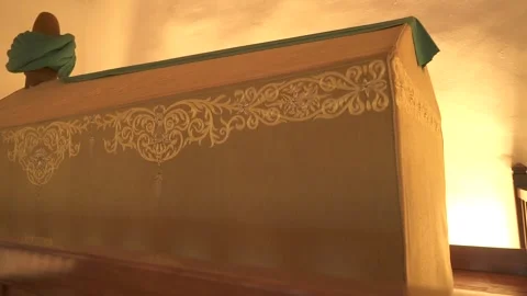 Cloth covered caskets rest inside Islamic tomb, sacred - Reverence Scene Stock Footage 339815191