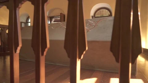 Cloth covered caskets rest inside Islamic tomb - Memorial Room and Ritual Space Stock Footage 341124636