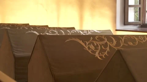 Cloth covered caskets rest within sacred worship - Islamic Shrine and Tomb Room Stock Footage 341124632