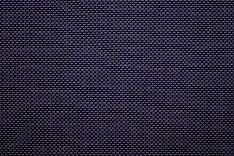 Cloth dark blue pattern background on fabric made of small rectangles Stock Photos