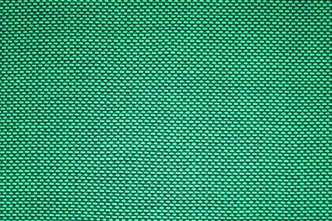 Cloth green pattern background on fabric made of small rectangles Stock Photos