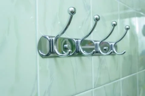Cloth hanger on tile background Stock Photos