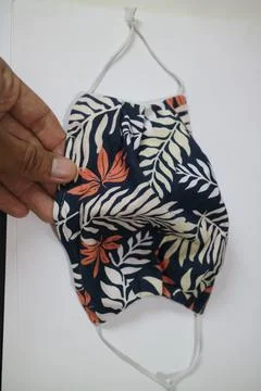 Cloth mask with leaf pattern Stock Photos