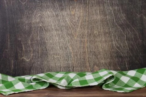 Cloth napkin at rustic table in front Stock Photos