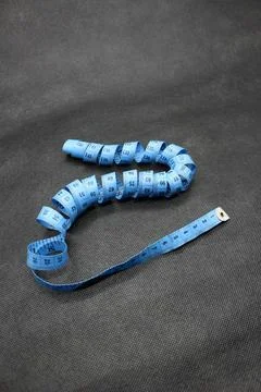 Cloth or clothing measuring Stock Photos