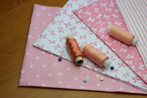 Cloth with thread coils Stock Photos