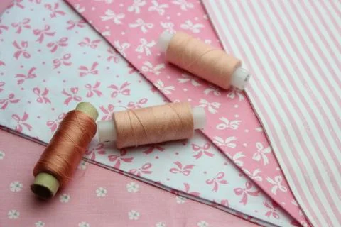 Cloth with thread coils Stock Photos