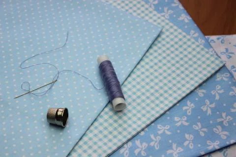 Cloth with thread coils Stock Photos