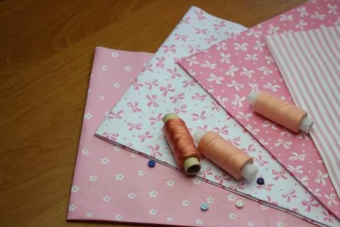 Cloth with thread coils Stock Photos