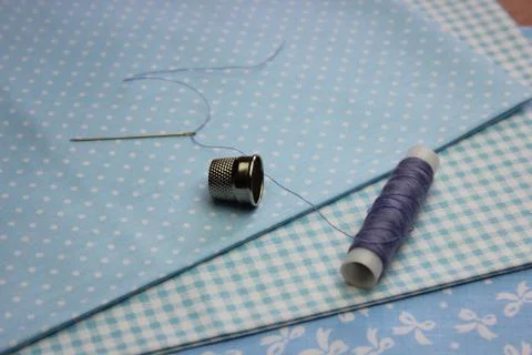 Cloth with thread coils Stock Photos