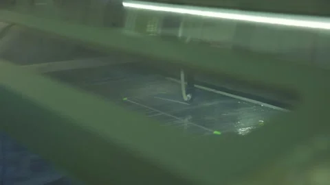 Clothe cutting in laser machine Stock Footage 210161735