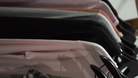 Clothe rack in a showroom Stock Footage 195099199
