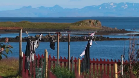 Clothes are dried on ropes between iron bars. Andreev. Stock Footage 78004919