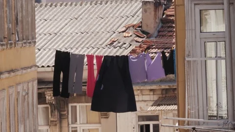 Clothes are drying in stanbul, turkey street, Colorful Laundry Pieces Gracefully Stock Footage 284148424