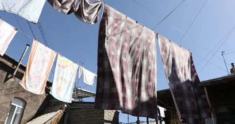 Clothes are hanging on a rope 1 Stock Footage 332173533