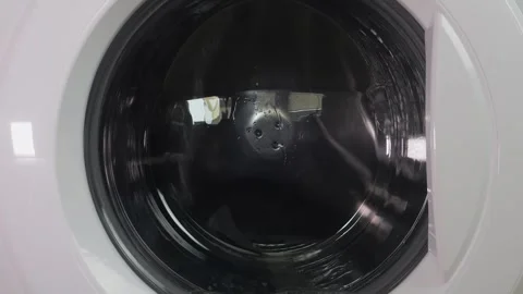 Clothes are washed in a washing machine, the drum Stock Footage 316256859