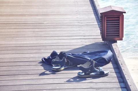 Clothes on the beach Stock Photos