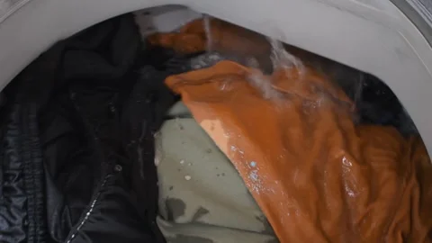 Clothes Being Washed in Washing Machine, Laundry Appliance Operating, Washer Stock Footage 315194083