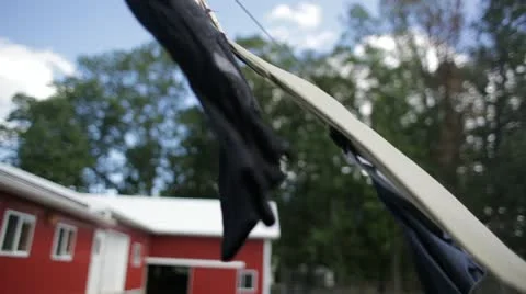Clothes Blowing on Clothesline Stock Footage 21458002