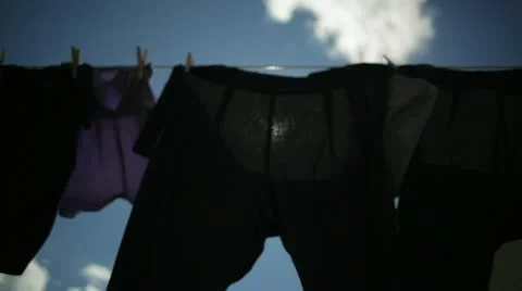 Clothes Blowing on Clothesline Stock Footage 21459160