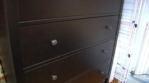 Clothes Into Chest of Draws Stock Footage 42482536