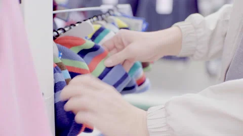 Clothes choice in supermarket Stock Footage 68692375