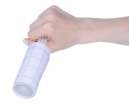 Clothes cleaning roller in hand Photos