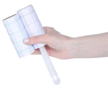 Clothes cleaning roller in hand Photos