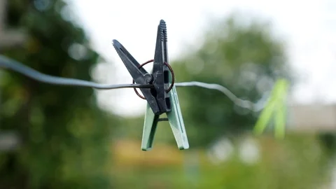 Clothes clips for clothes. Clothespin Stock Footage 80189911