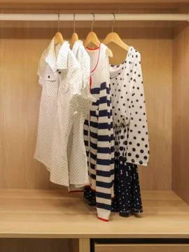 Clothes in the closet Stock Photos