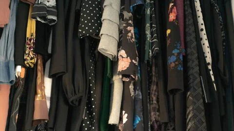 Clothes in closet Stock Photos