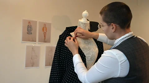 Clothes designer designing clothes Stock Footage 141680784