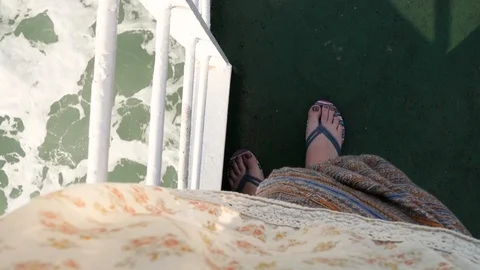 Clothes develop in the wind on the deck of a ship close-up. girl on a ship, the 스톡 동영상 126312694