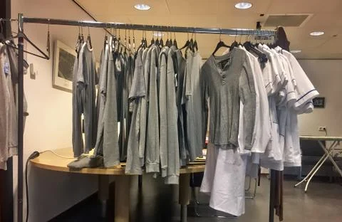 Clothes in a dressing room Stock Photos