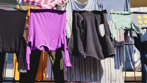 Clothes dried on the balcony in a slum Stock Footage 172345125