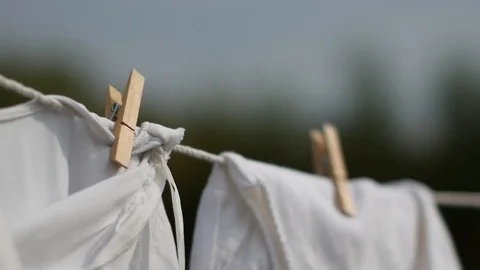 Clothes dries on the background of the house Stock Footage 94560692