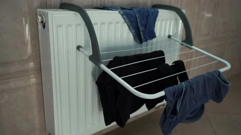 Clothes dryer in the bathroom Stock Footage 158395179