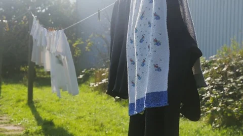 Clothes drying on the clothesline Stock Footage 71567074